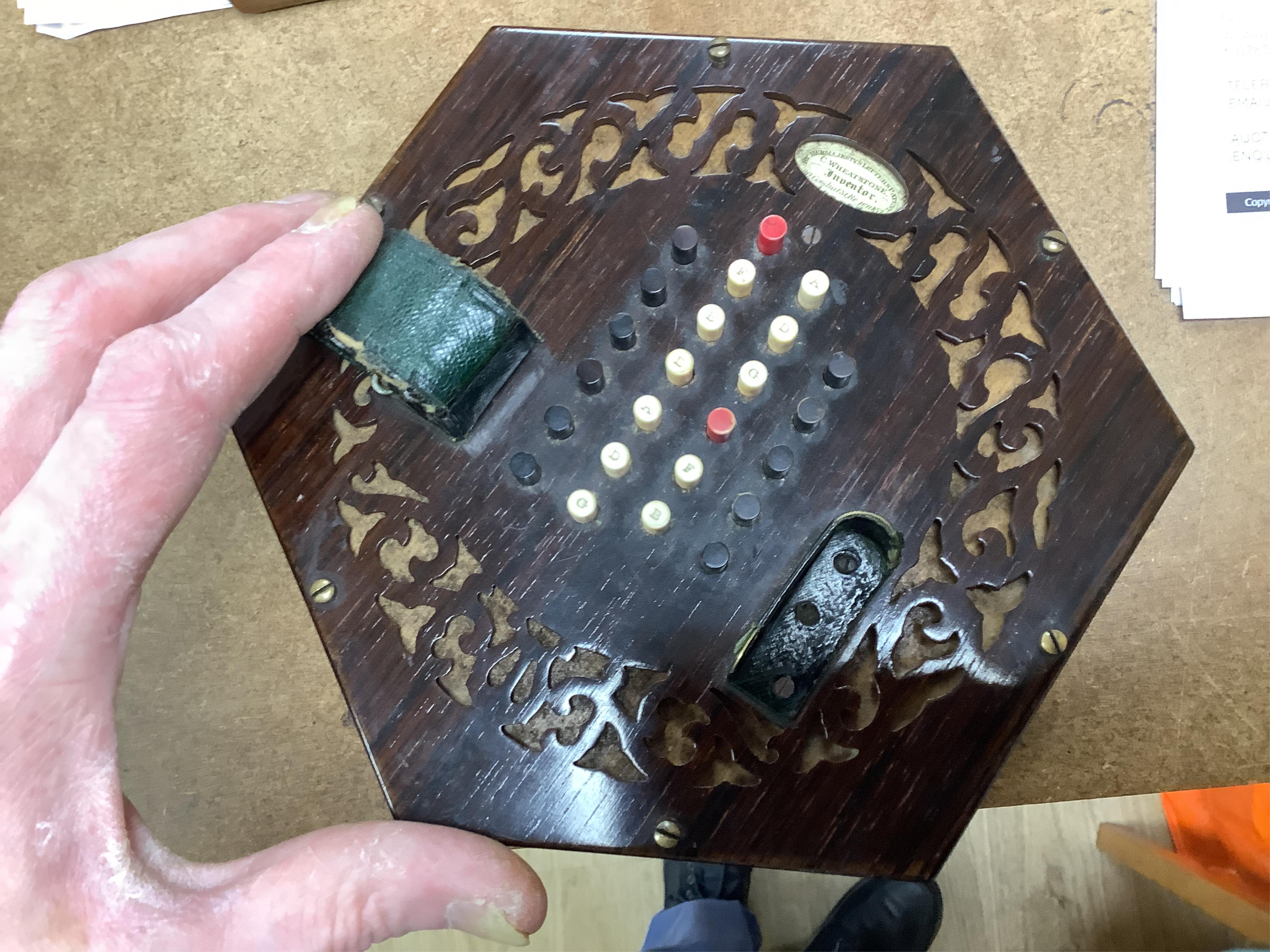 A Wheatstone concertina, in rosewood case, case 16.5cm high. CITES Submission reference, PS7AQEEA